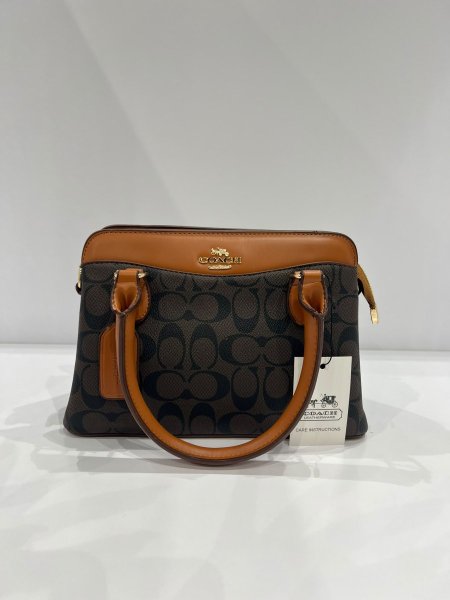 شنطة COACH